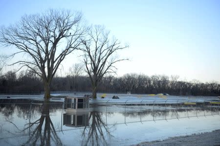 FILE PHOTO: One of many areas near the southeast side of Offutt Air Force Base affected by flood waters is seen in Nebraska, U.S., March 16, 2019. Courtesy Rachelle Blake/U.S. Air Force/Handout via REUTERS/File Photo