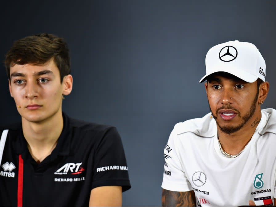 <p>Lewis Hamilton (right) praised George Russell for owning up to his crash at the weekend</p> (Getty Images)