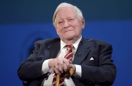 Former German Chancellor Helmut Schmidt smiles after his speech at his 95th birthday party, organized by German weekly magazine "Die Zeit", at a theater in Hamburg in this January 19, 2014 file photo. REUTERS/Fabian Bimmer/Files
