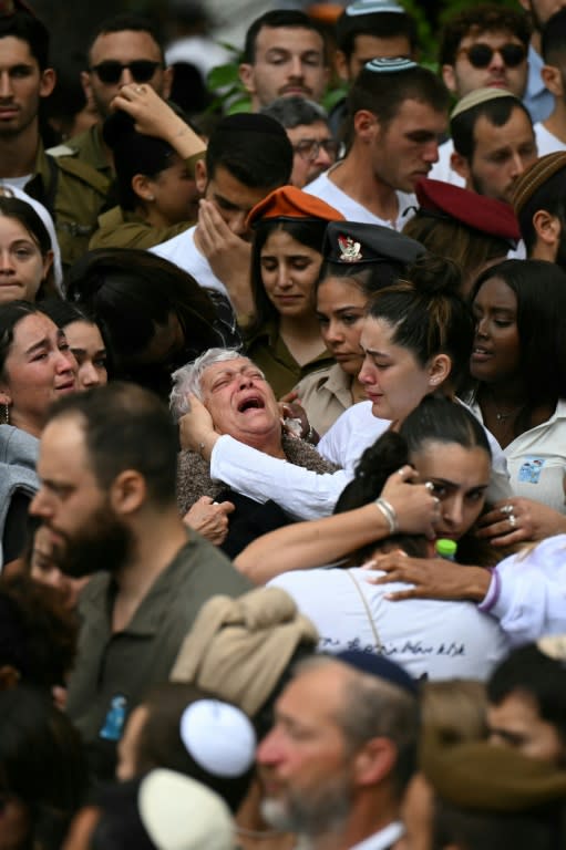 Israelis mourn during a cemermony at Jerusalem's Mount Herzl military cemetery on May 13, 2024, marking Memorial Day for fallen soldiers (RONALDO SCHEMIDT)