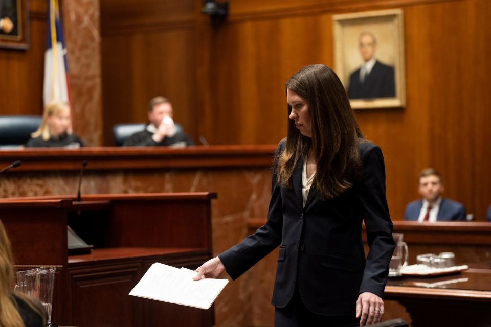 Natalie D. Thompson, representing the Texas attorney general's office, takes her seat after arguing Tuesday in support of SB 14 at the Texas Supreme Court.