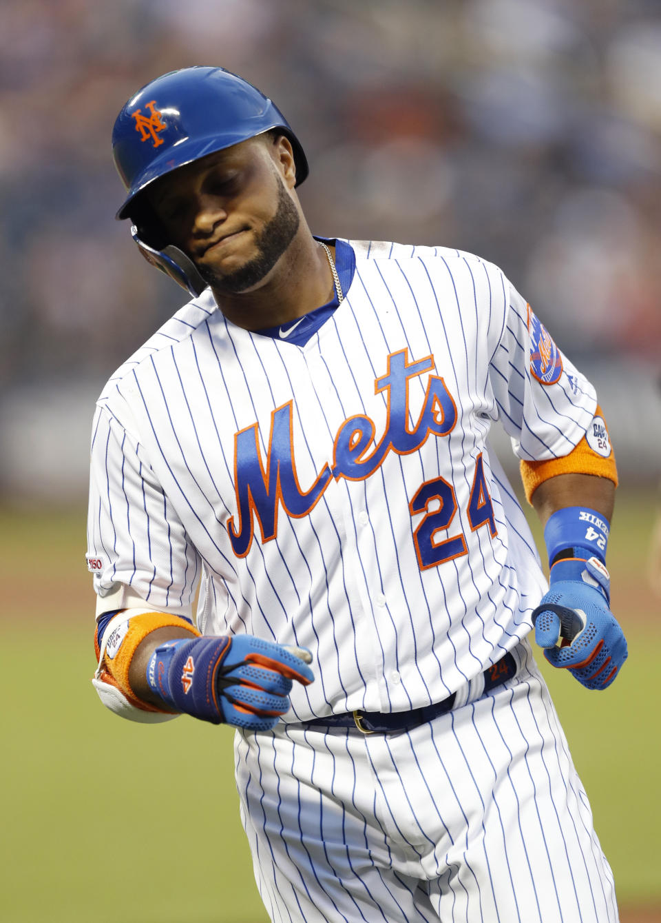 New York Mets' Robinson Cano reacts after grounding out with the bases loaded during the third inning of the team's baseball game against the San Francisco Giants, Wednesday, June 5, 2019, in New York. (AP Photo/Kathy Willens)