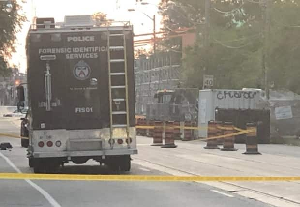 Police closed a stretch of Gerrard Street East for the investigation. (Linda Ward/CBC - image credit)