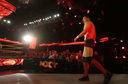 WWE wrestler Bin Wang of China enters the stage during a taping of the WWE's NXT show at Full Sail University in Winter Park, Florida, November 30, 2016. REUTERS/Scott Audette