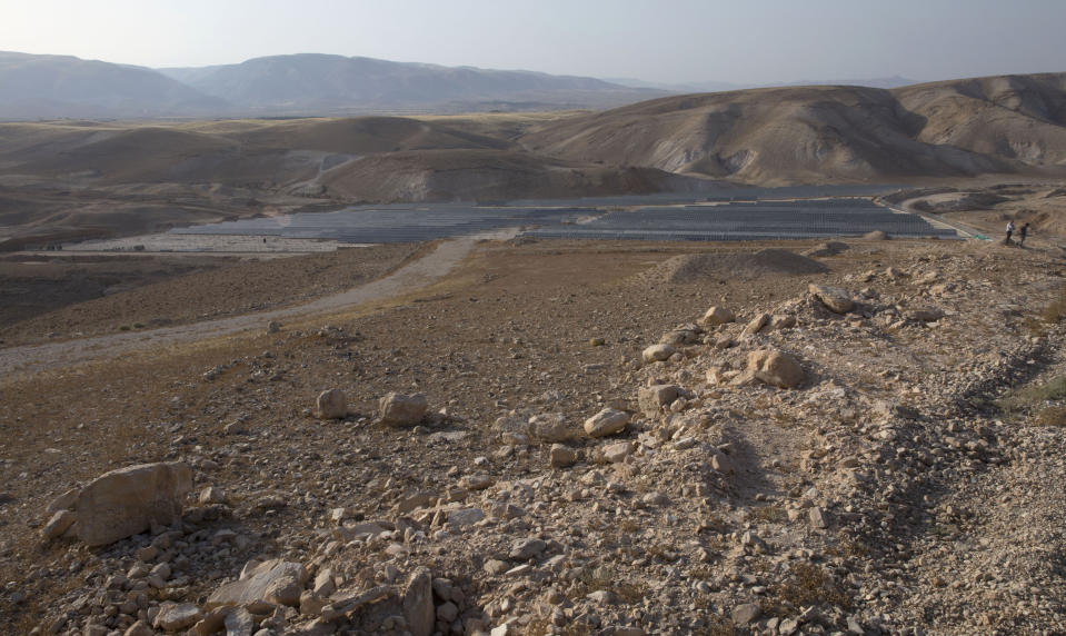 This Tuesday, May 21, 2019 photo, shows solar panels at the newly inaugurated Nour Jericho solar plant, in the ancient West Bank city of Jericho. Mohammed Mustafa, head of the government's investment fund, said Wednesday that the plant is one of four planned plants. He said the Palestinians rely almost entirely on power imported from Israel and the new plants are part of a long-term project to reduce that by 50% over the next decade. (AP Photo/Nasser Nasser)