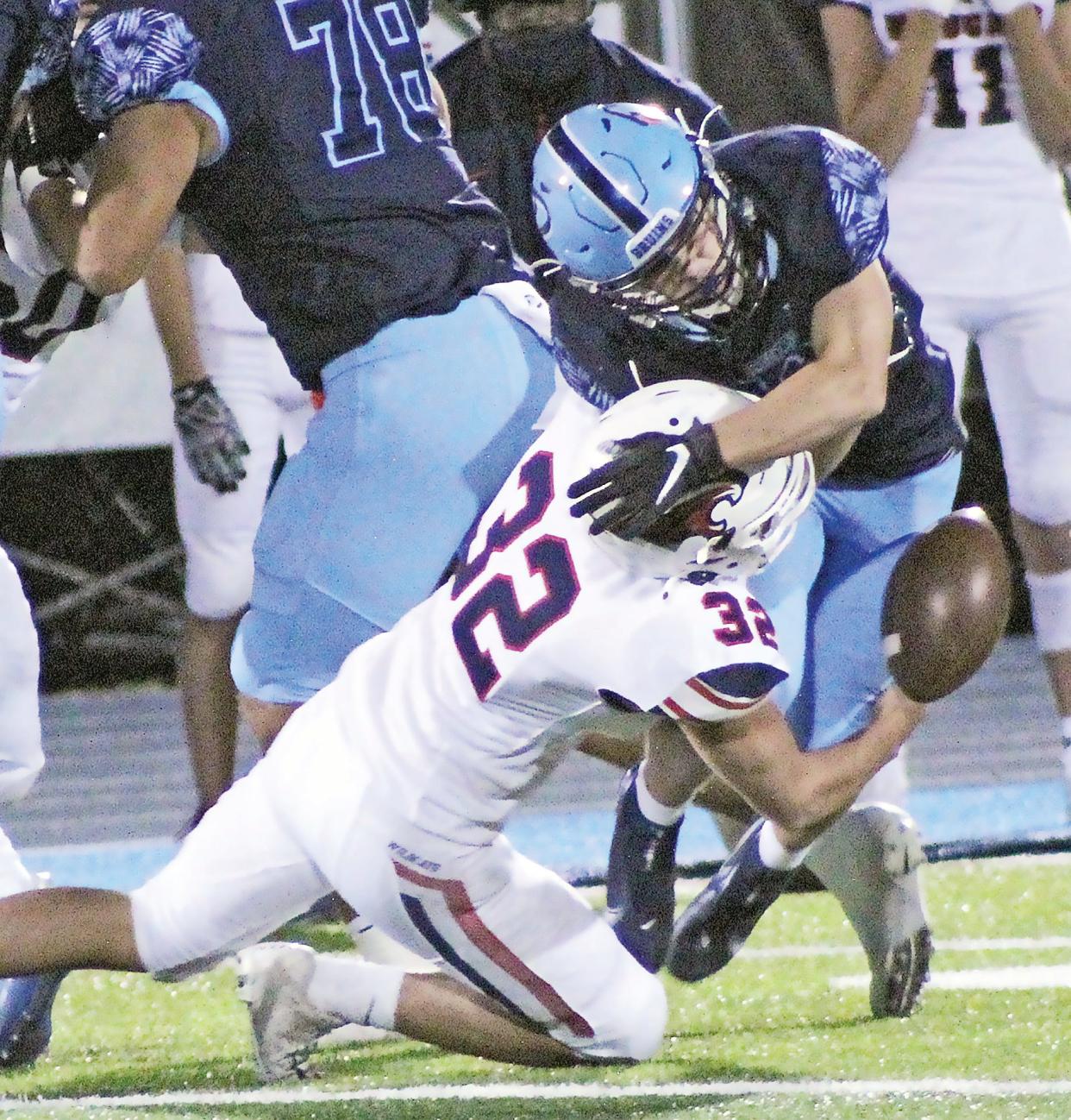 The ball comes loose after a collision between Bartlesville High's Dylan McCoy, right and Ponca City's Collier Lively during a smashmouth football battle in Bartlesville, during the 2020 season. The 2022 season will mark the 39th meeting since 1982 between Bartlesville and Ponca City.