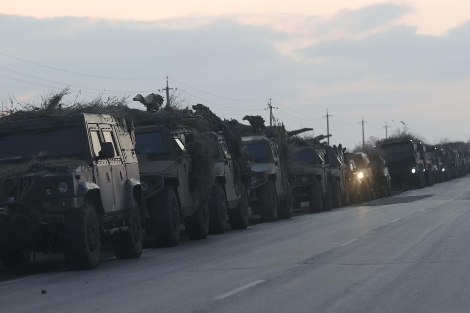 A convoy of Russian military vehicles is seen as the vehicles move towards border in Donbas region of eastern Ukraine on February 23, 2022 in Russian border city Rostov.