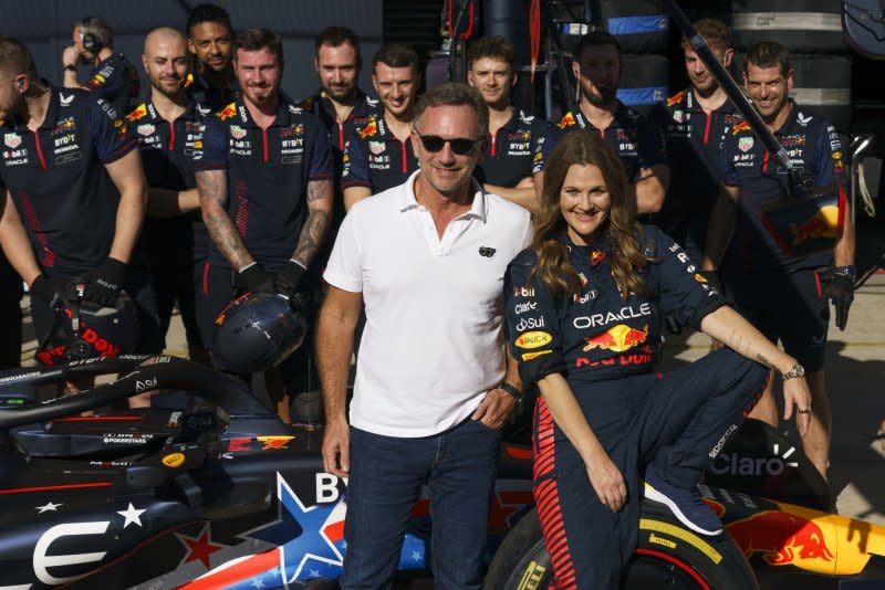 Red Bull Racing team chief Christian Horner and actress Drew Barrymore pose for a photo in pit lane during the Formula One Grand Prix of the US at the Circuit of The Americas in Austin, Texas, in 2023. File Photo by Greg Nash/UPI