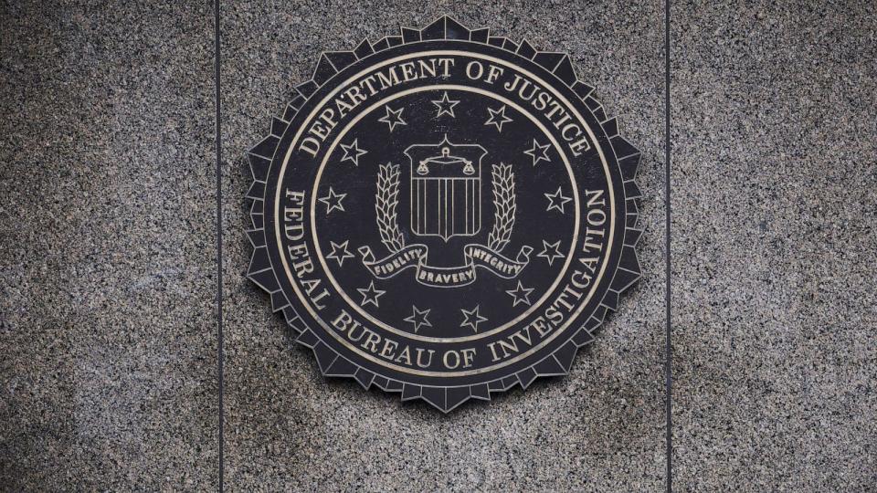 PHOTO: The Federal Bureau of Investigation seal is displayed outside the FBI headquarters, Feb. 2, 2018, in Washington. (T.J. Kirkpatrick/Bloomberg via Getty Images)