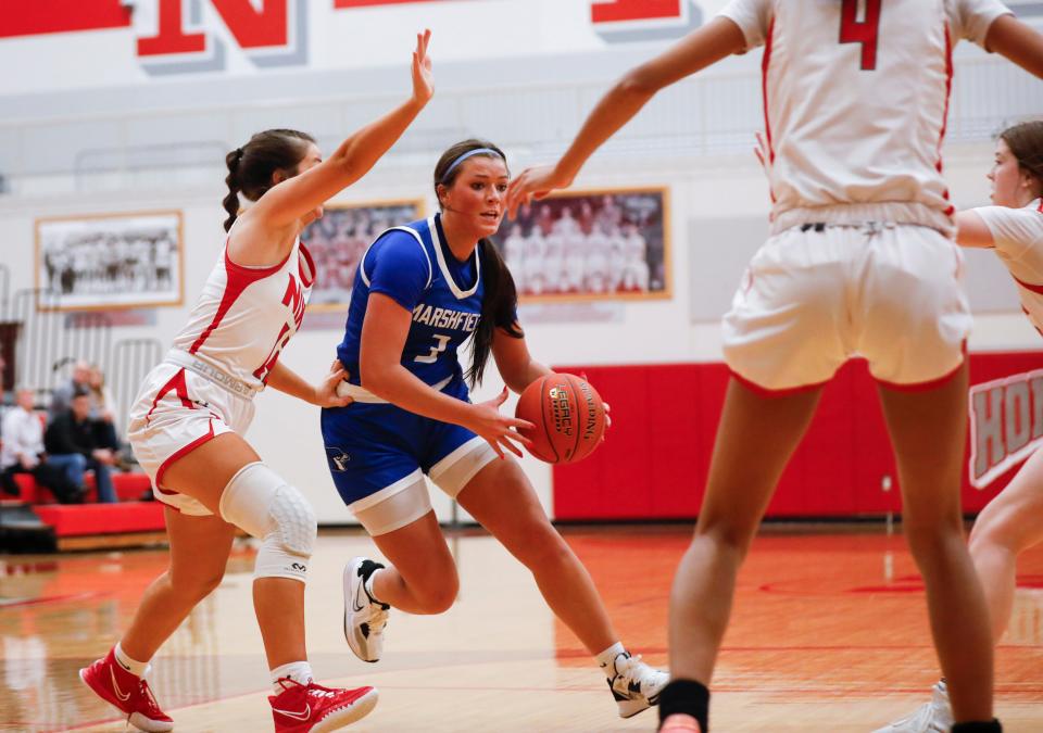 Marshfield's Lauren Luebbert drives to the basket during a game against the Nixa Lady Eagles at Nixa on Tuesday, Dec. 6, 2022.