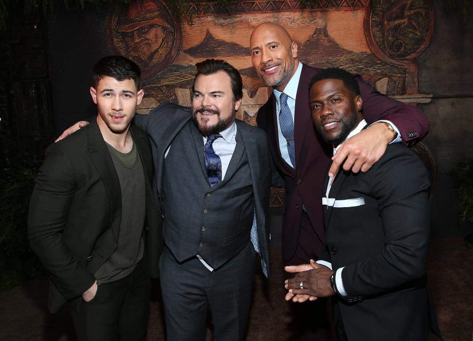 HOLLYWOOD, CA - DECEMBER 11:  (L-R) Nick Jonas, Jack Black, Dwayne Johnson, and Kevin Hart attend the premiere of Columbia Pictures' 'Jumanji: Welcome To The Jungle' on December 11, 2017 in Hollywood, California.  (Photo by Phillip Faraone/Getty Images)