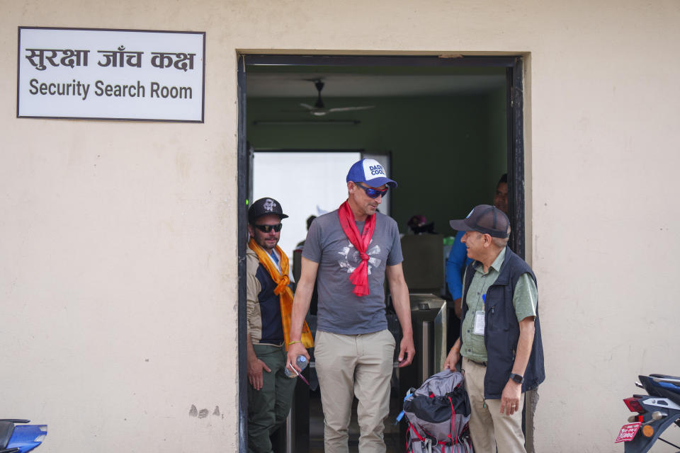 British mountaineer Kenton Cool who successfully completed his 17th summit of Mount Everest arrives at the airport in Kathmandu, Nepal, Friday, May 19, 2023. The British mountain guide who just set a record for the highest number of Mount Everest summit among non-Nepali climbers returned from the mountain Friday said it was his coldest climb on the world's highest mountain. (AP Photo/Niranjan Shrestha)