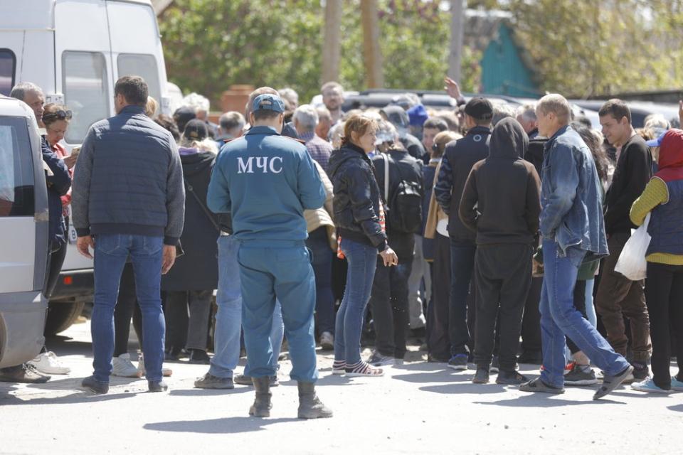 Several dozen Ukrainian civilians, who had been living in the bomb shelters of the Azovstal plant for more than a month, are seen being evacuated in Mariupol (Anadolu Agency via Getty Images)