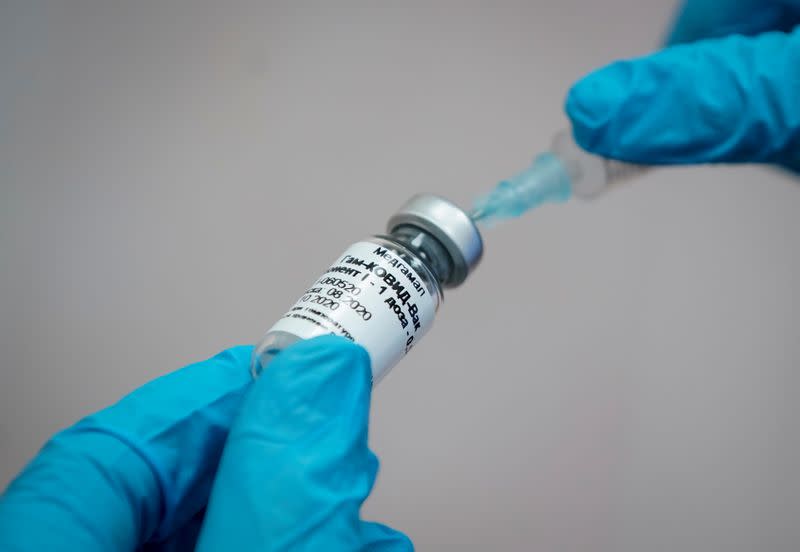 A nurse prepares Russia's "Sputnik-V" vaccine against the coronavirus disease (COVID-19) for inoculation in a post-registration trials stage at a clinic in Moscow