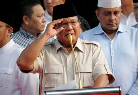 Indonesian presidential candidate Prabowo Subianto speaks to the media after polls closed in Jakarta, Indonesia April 17, 2019. REUTERS/Willy Kurniawan