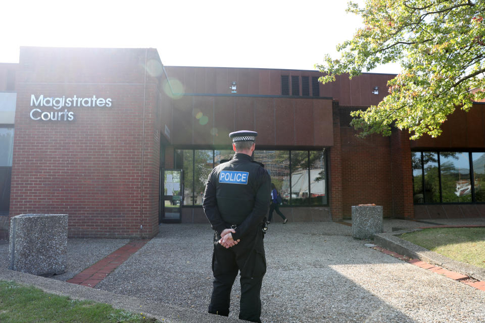 A police officer outside Reading Magistrates Court where Jed Foster appeared on Tuesday. (PA)