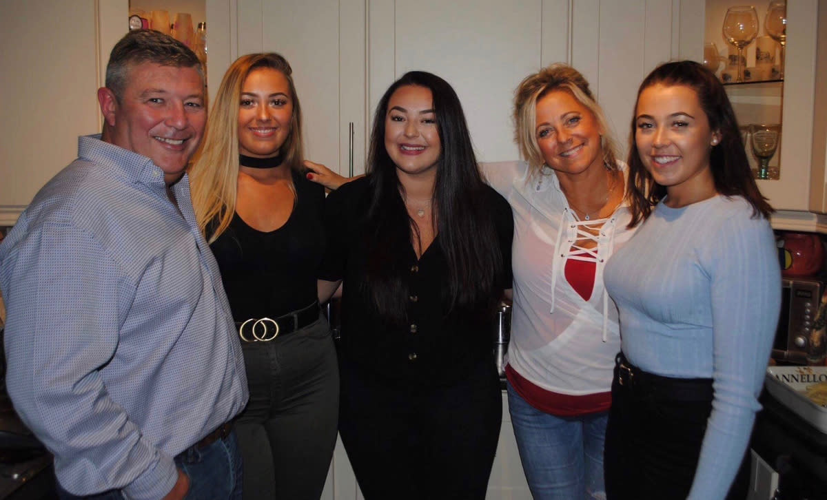 Brian McMillen with his late wife Lally (second from right) with their daughters Kashia (second from left), Chloe (centre), and Georgia (right) (Brian McMillen/PA)