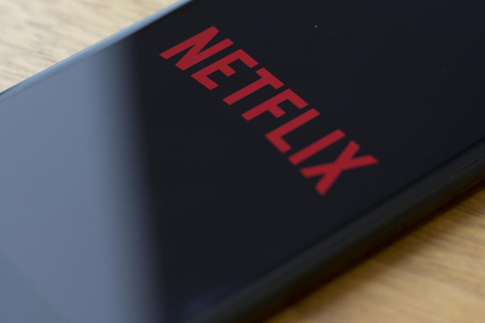 The Netflix logo is seen on a phone in this photo illustration in Washington, DC, on July 10, 2019. (Photo by Alastair Pike / AFP)        (Photo credit should read ALASTAIR PIKE/AFP/Getty Images)