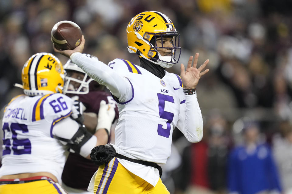 LSU quarterback Jayden Daniels throws a pass against Texas A&M during the second quarter of an NCAA college football game Saturday, Nov. 26, 2022, in College Station, Texas. (AP Photo/Sam Craft)