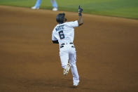 Miami Marlins' Starling Marte celebrates as he rounds first base after hitting a home run during the eighth inning of a baseball game against the Toronto Blue Jays, Tuesday, Sept. 1, 2020, in Miami. (AP Photo/Wilfredo Lee)