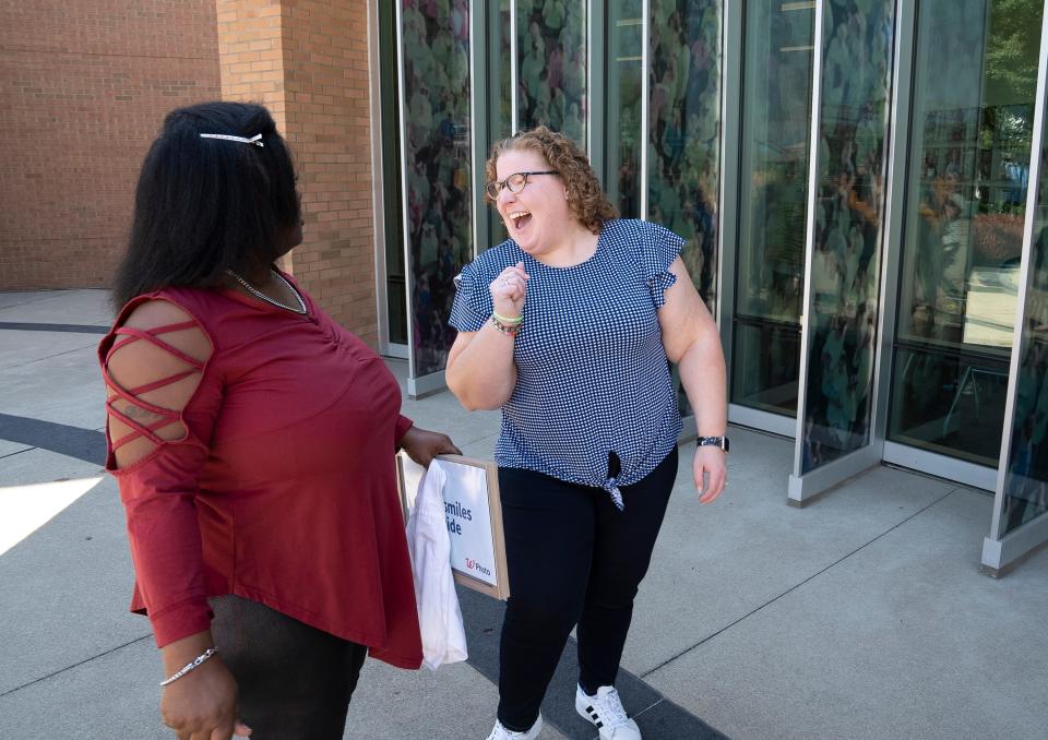 Ronna Dixon-Young and Jess Schnur share a laugh Sunday at the Lifeline of Ohio offices, where they met in person for the first time. Schnur received a liver donation from Young's son, DeVille Morrow when he passed away on Aug. 9, 2021.
