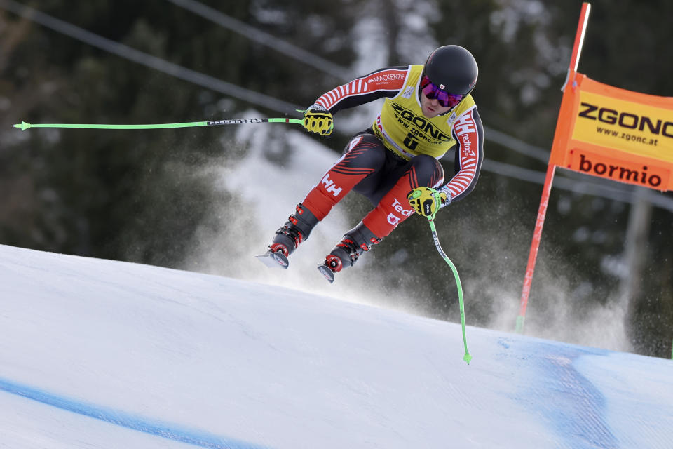 Canada's Cameron Alexander speeds down the course during an alpine ski, men's World Cup downhill race, in Bormio, Italy, Thursday, Dec. 28, 2023. (AP Photo/Marco Trovati)