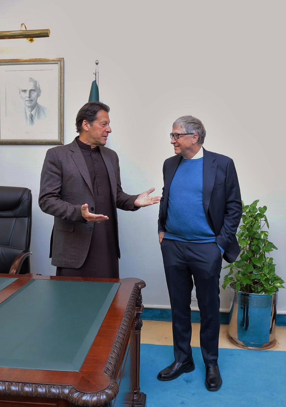 In this photo released by Pakistan's Press Information Department, The Microsoft co-founder and billionaire philanthropist Bill Gates, right, listens to Pakistan's Prime Minister Imran Khan during their meeting, in Islamabad, Pakistan, Thursday, Feb. 17, 2022. Gates appreciated Pakistan's successful response to COVID-19 during his series of meetings with government officials in the capital, Islamabad, a government statement said, as Pakistan registered a steady decline in fatalities from coronavirus. (Press Information Department via AP)