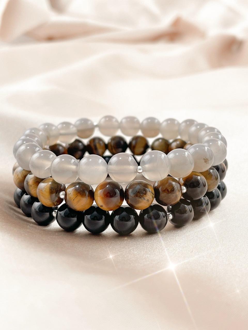 <p><a href="https://truewarriorjewelry.com/collections/stacks/products/strength-stack-grey-agate-tiger-eye-onyx-healing-bracelet?variant=40206626914349" rel="nofollow noopener" target="_blank" data-ylk="slk:Shop Now;elm:context_link;itc:0;sec:content-canvas" class="link ">Shop Now</a></p><p>Strength Stack</p><p>truewarriorjewelry.com</p><p>$67.90</p>