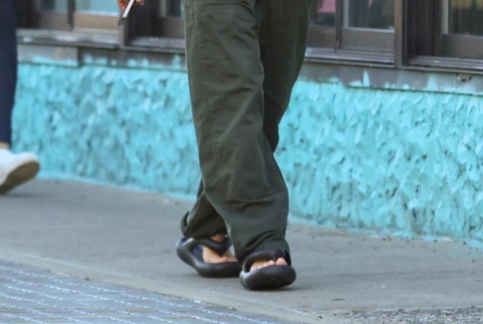 A closer look at the Axel Arigato Delta sandals worn by Emily Ratajkowski while walking around New York City