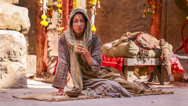 An extra sits in the background during filming of a faith-based streaming series on the life of Jesus Christ called “The Chosen” at The Church of Jesus Christ of Latter-day Saints’ Jerusalem set in Goshen, Utah County, on Monday, Oct. 19, 2020.