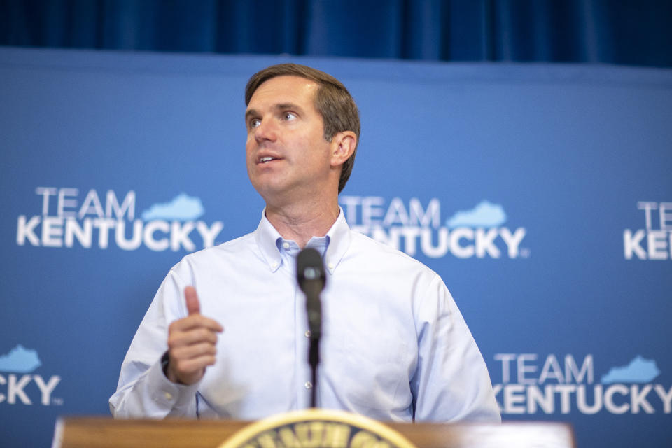 FILE - Kentucky Gov. Andy Beshear speaks during a news conference, Thursday, June 10, 2021 in Frankfort, Ky. Gov. Beshear on Thursday, June 24, 2021 dangled a $1,500 bonus meant to lure thousands of unemployed Kentuckians back to work, offering it as an alternative to an early cutoff of enhanced jobless benefits that Republicans and businesses blame for a workforce shortage. (Ryan C. Hermens/Lexington Herald-Leader via AP, Pool)