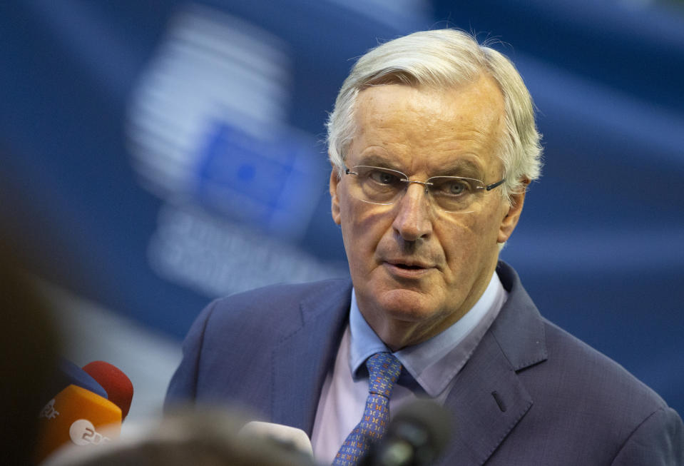 European Union chief Brexit negotiator Michel Barnier speaks with the media as he arrives for a meeting of EU General Affairs ministers, Article 50, at the European Convention Center in Luxembourg, Tuesday, Oct. 15, 2019. European Union chief Brexit negotiator Michel Barnier is in Luxembourg on Tuesday to brief ministers on the state of play for Brexit. (AP Photo/Virginia Mayo)