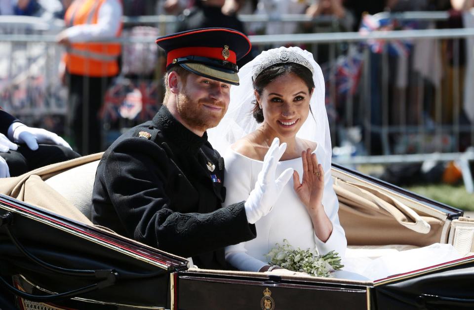 meghan markle and prince harry in their wedding carriage