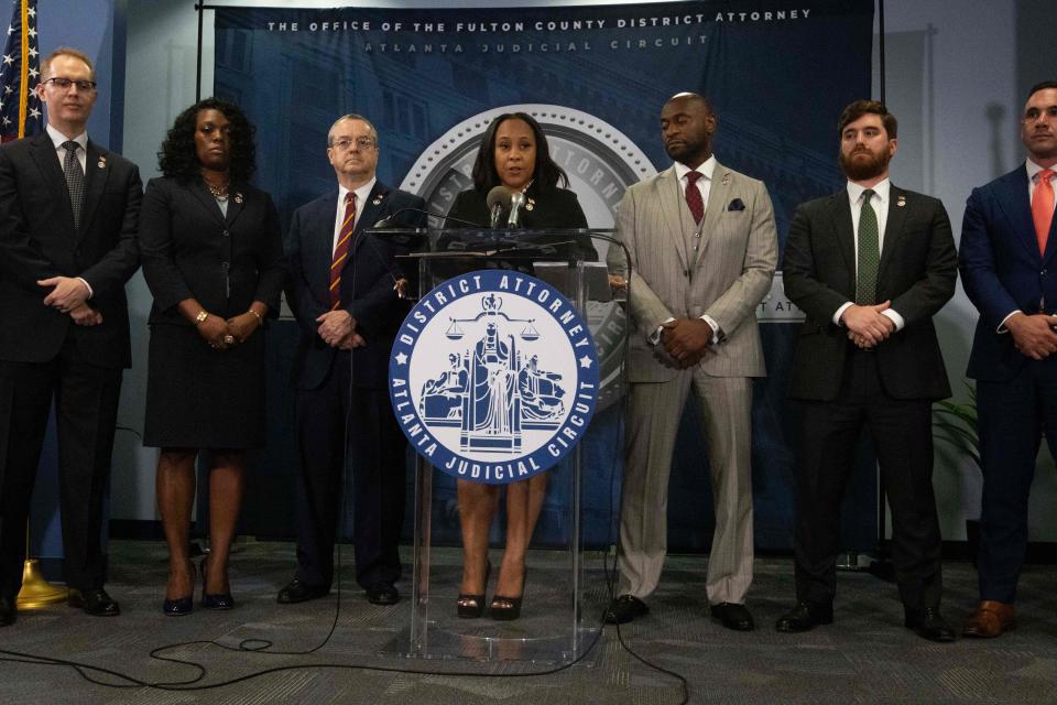 Fulton County District Attorney Fani Willis holds a press conference in the Fulton County Government Center after a grand jury voted to indict former US President Donald Trump and 18 others on August 14, 2023, in Atlanta, Georgia. The Georgia prosecutor who brought sweeping charges against former president Donald Trump and 18 other defendants said Monday, August 14, that she wants to hold their trial 