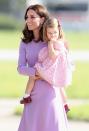 <p>On the final leg of their German tour, Kate and Charlotte wore complementary shades of purple and pink.</p>
