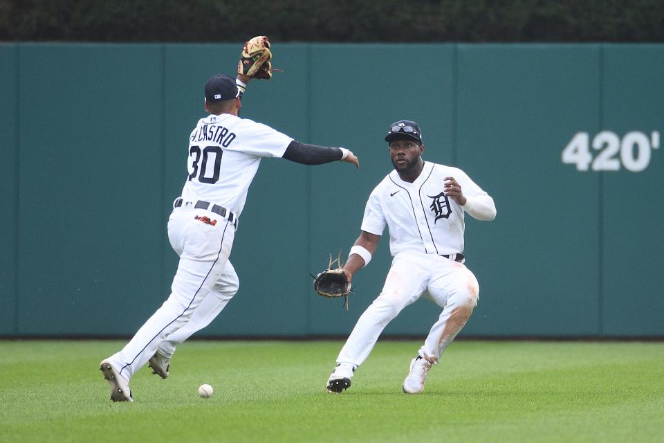 Detroit Tigers second baseman Harold Castro (30) and center fielder Akil Baddoo (60) are unable to make a catch during the game inning against the Tampa Bay Rays at Comerica Park, Sept. 12, 2021.