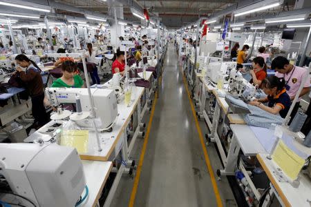 Labourers work at TAL garment factory in Vinh Phuc province, Vietnam May 23, 2017. Picture taken May 23, 2017. REUTERS/Kham