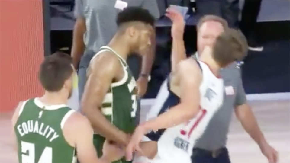 Milwaukee's Giannis Antetokounmpo is pictured headbutting Washington Wizards forward Mo Wagner. 