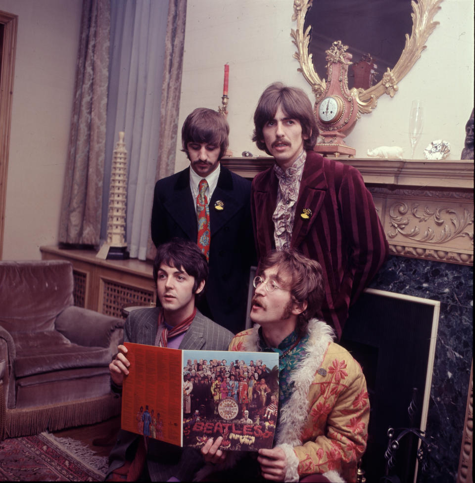 The Beatles pose for the press with their newly completed album, 'Sergeant Pepper's Lonely Hearts Club Band', at the press launch for the album, held at manager Brian Epstein's house at 24 Chapel Street, London, 19th May 1967. Clockwise from top left: Ringo Starr, George Harrison (1943 - 2001), John Lennon (1940 - 1980) and Paul McCartney. (Photo by Mark and Colleen Hayward/Getty Images)