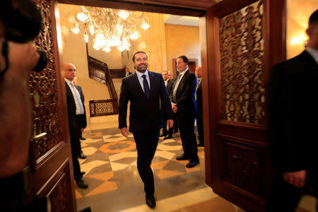 Lebanon's former prime minister Saad al-Hariri walks into a press conference room at his home in Beirut, Lebanon October 20, 2016. REUTERS/Jamal Saidi