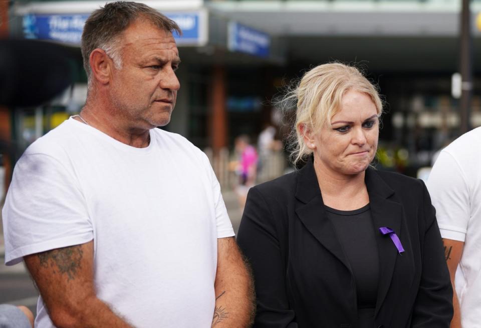 Archie’s parents Paul Battersbee and Hollie Dance outside the Royal London Hospital (PA)