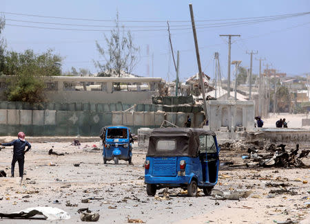 Rickshaws are seen near the scene of a suicide explosion after al-Shabaab militia stormed a government building in Mogadishu, Somalia March 23, 2019. REUTERS/Feisal Omar