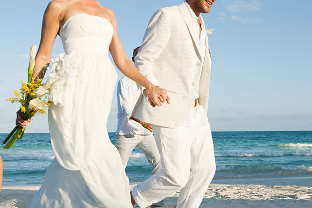 <p>Getty</p> A bride and groom (stock image)