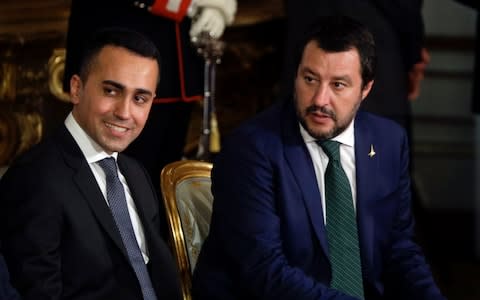 Leader of the League party, Matteo Salvini, right, sits by Luigi Di Maio, leader of the Five-Star movement - Credit: Gregorio Borgia/AP