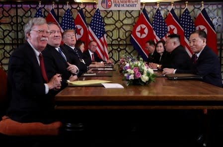 FILE PHOTO: FILE PHOTO: North Korea's leader Kim Jong Un and U.S. President Donald Trump attend the extended bilateral meeting in the Metropole hotel during the second North Korea-U.S. summit in Hanoi