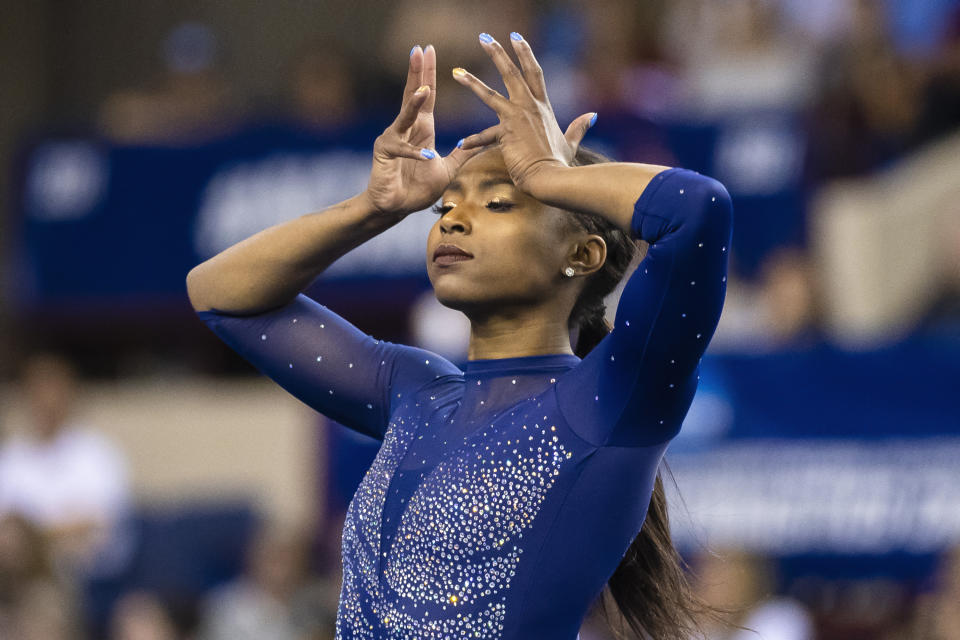 FORT WORTH, TX - APRIL 20: Nia Dennis #701 of the UCLA Bruins performs a floor routine during the Division I Women's Gymnastics Championship held at the Fort Worth Convention Center Arena on April 20, 2019 in Fort Worth, Texas. (Photo by Timothy Nwachukwu/NCAA Photos via Getty Images)