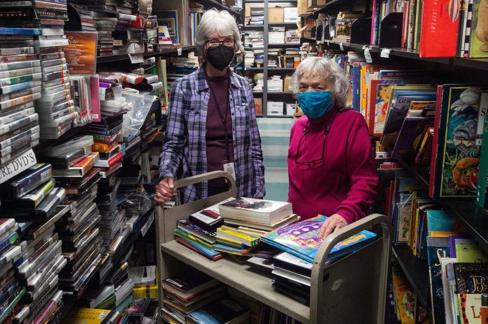 Friends of Erie County Public Library Board Members Carol Gettinger, left, and Marion Gallivan stand in a storage room of the Blasco Library, on Feb. 16, where they sorted books in preparation for the upcoming Great American Book Sale.