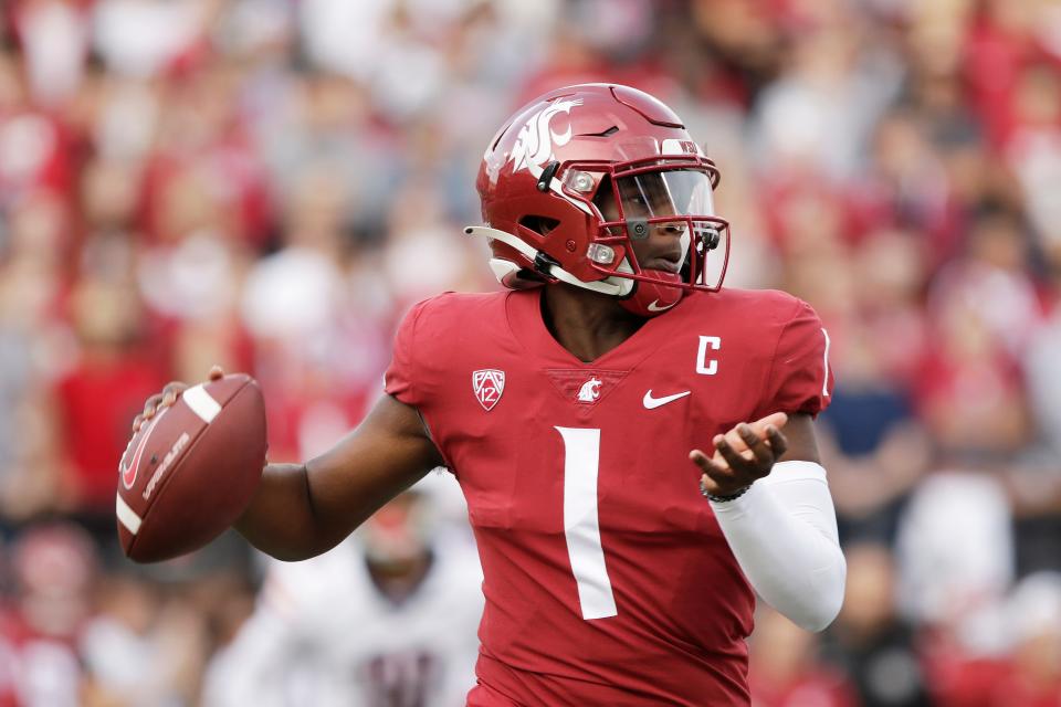 Washington State quarterback Cameron Ward looks for a receiver during the first half of the team's NCAA college football game against Arizona on Oct. 14, 2023, in Pullman, Wash.