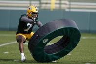 Green Bay Packers' Quay Walker runs a drill during an NFL football rookie minicamp Friday, May 6, 2022, in Green Bay, Wis. (AP Photo/Morry Gash)