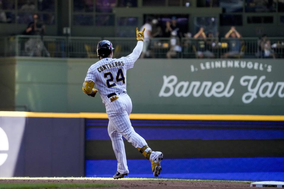 Milwaukee Brewers' William Contreras reacts after hitting a home run during the first inning of a baseball game against the Philadelphia PhilliesSunday, Sept. 3, 2023, in Milwaukee. (AP Photo/Morry Gash)